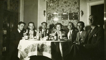 vintage bachelor's party Vintage men group photo at dinner table.