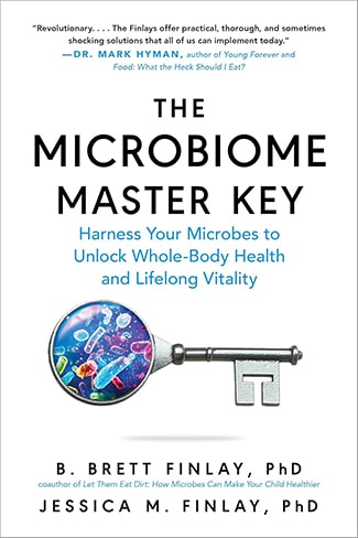 Book cover of "The Microbiome Master Key" featuring a key with microbes inside it, and subtitle "Harness Your Microbes to Unlock Whole-Body Health and Lifelong Vitality.