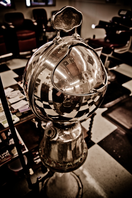 Antique gas towel warmer at barber shop.