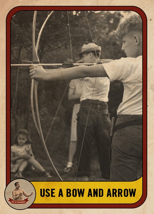 Vintage boys shooting a bow and arrow.