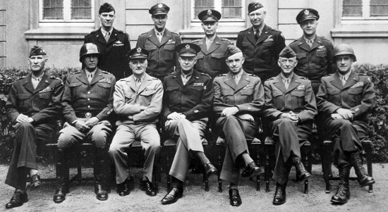 A group of men in military uniforms showcasing their leadership traits.