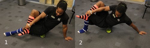 Foam roller exercise for butt glutes.