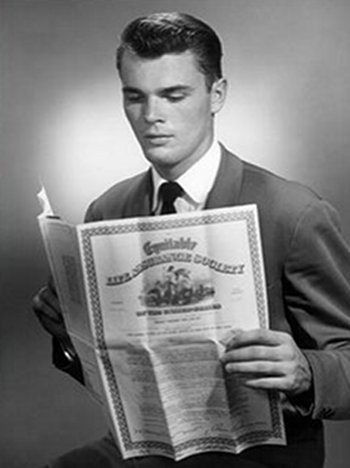 insurance Young man in suit reading the insurance paper.