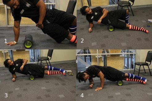 Using foam roller on it band.