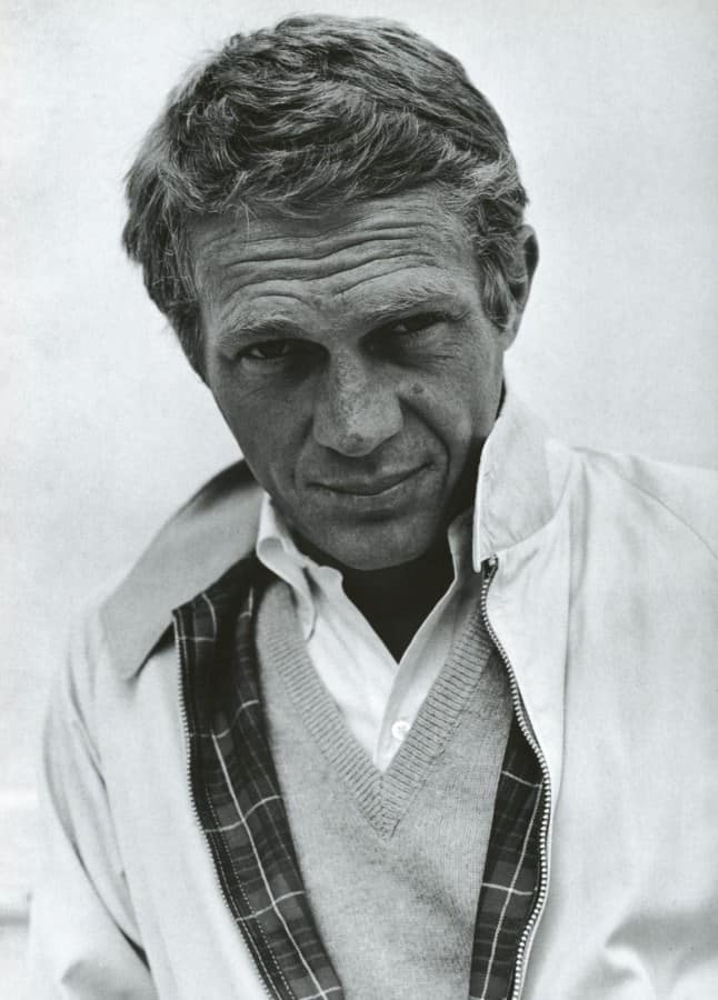 Steve mcqueen wearing a harrington blouson jacket.