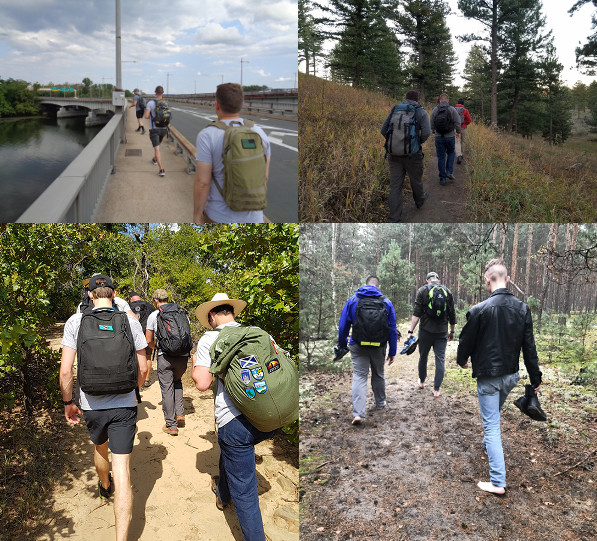 Mans are walking with there bags on back.