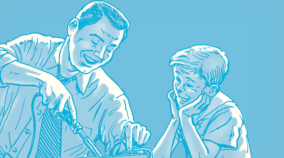 A man is guiding a beginner with a screwdriver.