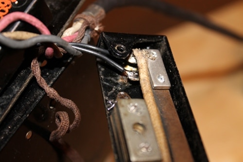 Vintage connecting some new wire to the soldering terminals on the receiver switch.