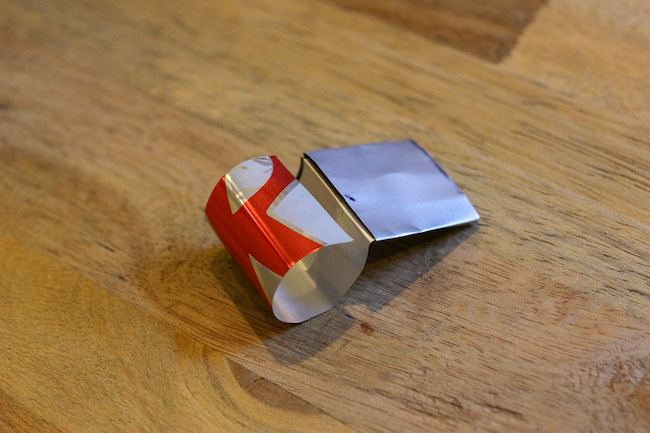 A piece of paper on a wooden table.