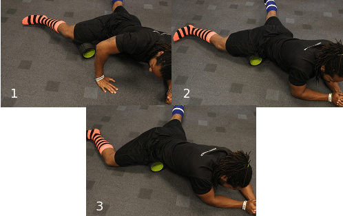 Using foam roller on inner quad thigh muscles.